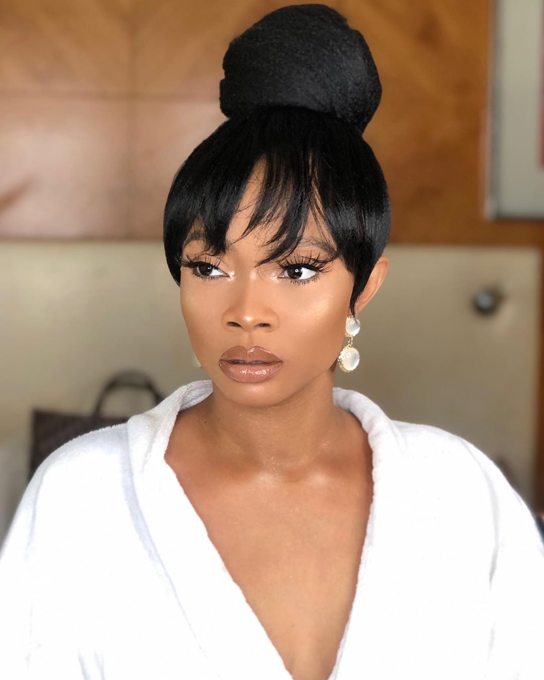 Naira Marley causes an uproar at Toke Makinwa's party