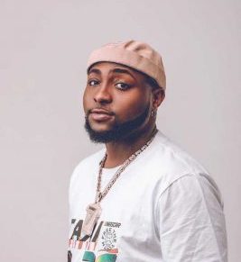 Davido and Chance the rapper launch out a song in a club.