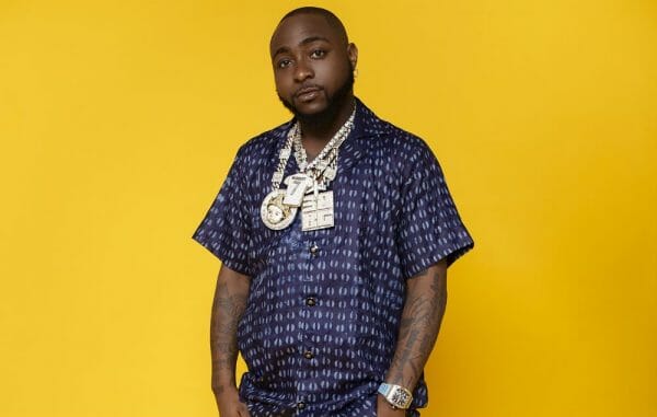 Fans Tattoos Davido All Over His Body