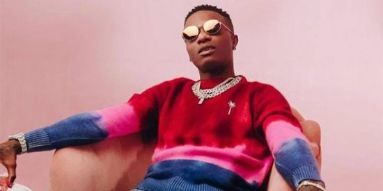 Female Fans fight over Wizkid’s sweaty towel during concert
