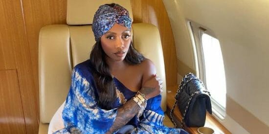 Tiwa Savage flaunts her new customized diamond pendant