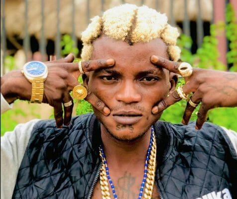 Portable stops friends from picking dollar bills sprayed on him