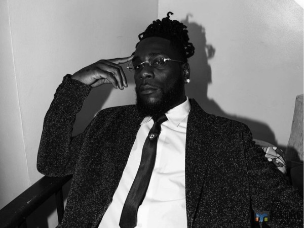 Burna Boy stirs reaction with his newest love interest.